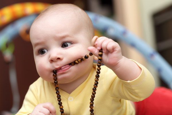 Child Mouthing an Object